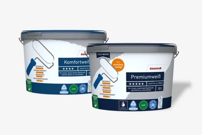 Zwei Farbeimer mit weißer Wandfarbe